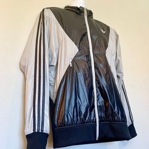 Adidas Originals windbreaker w/ retractable hood.